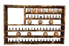 an old wooden rack with baseballs on it