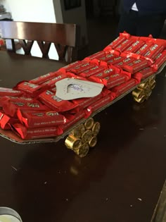 a skateboard made out of candy bars on a table