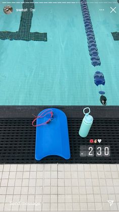 an empty swimming pool with water bottles and other items