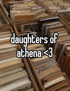 the words daughters of athena 3 are in front of many stacks of books