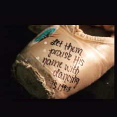 a piece of cloth with writing on it that says at him grace his name with dancing shoes