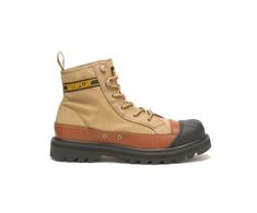 The Omaha is a style that’s heavily inspired by a vintage US Navy boot and Cabourn’s past work. A luxe-utilitarian canvas high top, it’s a true hybrid and meeting of minds. Laceless Work Boots, Nigel Cabourn Style, Rugged High-top Lace-up Boots For Work, Fall Steel Toe Lace-up Boots For Outdoor Work, Fall Rubber Sole Work Boots For Streetwear, Casual Steel Toe Lace-up Desert Boots, Streetwear Lace-up Desert Boots With Reinforced Toe, Fall Streetwear Work Boots With Rubber Sole, Casual Brown Work Boots For Streetwear