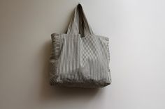 A really lovely, large bag made in French cotton ticking. It can be comfortably worn across the body for every day use. We have also made it with handles for the times when you want to hold it like a tote. Very handy indeed. Each bag has it's own unique lining! Fully lined in cotton shirt fabrics, with two internal pockets. The shirts used to line our bags are from quality shirt makers of Jermyn Street, London. Our fabrics are of the highest quality, making it a very strong, versatile bag for an Shirt Maker, Sewing Embroidery, Life Savers, Large Bag, Ticks, The Times, Bags Accessories, Cambridge, Bag Making