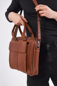 - Our product is 100% genuine leather. - It is produced in master hands with quality materials and delicate handwork. - Dimensions 29 x 39 cm Light Brown Shoulder Bag For Business, Brown Leather Briefcase For Daily Use, Luxury Leather Satchel In Camel, Luxury Leather Camel Satchel, Luxury Camel Leather Satchel, Classic Light Brown Business Satchel, Business Brown Briefcase With Leather Backing, Brown Vegetable Tanned Leather Shoulder Bag For Business, Brown Leather-lined Briefcase For Daily Use