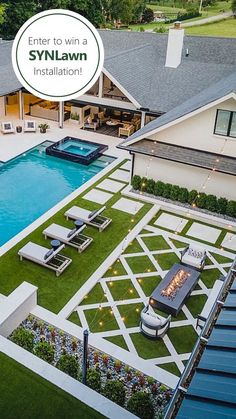 an aerial view of a house with a swimming pool and patio area in the foreground