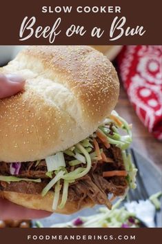 slow cooker beef on a bun with coleslaw slaw and lettuce