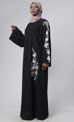 Round neck Ranglen full length sleeves Front with floral thread work Loose fit Fabric:-Nida Care:- Machine Wash Cold Eid Long Sleeve Abaya With Floral Embroidery, Black Long Sleeve Abaya With Floral Embroidery, Eid Abaya With Floral Embroidery And Long Sleeves, Traditional Long Sleeve Abaya For Spring, Elegant Black Abaya With Floral Embroidery, Black Thobe With Floral Embroidery And Long Sleeves, Long Sleeve Thobe For Eid, Black Long Sleeve Thobe With Floral Embroidery, Elegant Long Sleeve Thobe With Floral Embroidery