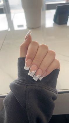 Coffin white french tip with flowers Flowers With French Tip, White Nails French Tip With Designs, Coffin White French Tip, Coffin French Tip Nails With Design, White French Tips With Flowers, White French Tip With Flowers, White French Tip With Design, French Tip With Flowers, Short Coffin Nails Designs