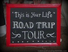 a sign that says this is your life road trip tour written in chalk on it