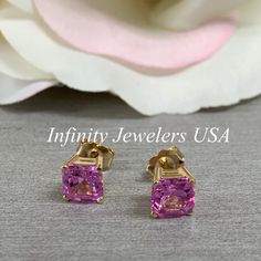 "These earrings are asscher cut lab created pink sapphires made with pure 14k yellow gold item #6436 -Approximate total carat weight: 2.00ctw -Center Stone Size: 1.00ct each 6x6mm -Gem Type: Lab Created Sapphire -Stone Shape: Asscher Cut -Stone Clarity: VS2 -Stone Color: Pink -Metal Type and Purity: 14K Yellow Gold -Setting: 4 Prong Basket Style -Backing: Friction Back (earring backs are subject to change due to availability) -Country of Manufacturing: USA (Michigan) For customization please con Gia Certified Classic Pink Sapphire Jewelry, Classic Gia Certified Pink Sapphire Jewelry, Pink Emerald Cut Gia Certified Jewelry, Gia Certified Pink Emerald Cut Jewelry, Gia Certified Emerald Cut Pink Jewelry, Gia Certified Pink Fine Jewelry Earrings, Classic Pink Gemstone Earrings, Pink Gia Certified Jewelry, Pink Asscher Cut Jewelry For Gift