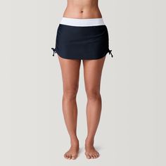 With flattering shirring in all the right places, this versatile swim skirt looks great in the water or on the boardwalk. Featuring a waist-slimming band and a coordinating built-in brief, you can feel covered and supported. Adjustable side ties run the full length of the skirt, giving you the ability to shorten or lengthen and add more or less ruching. Attached inner brief Elastic waistband Side shirring Sun Free: UPF 50+ protection FLX Free: Four-way stretch Feel Free: Supportive fit Dry Free: Parka Jacket Women's, Womens Ski Pants, Skirt Looks, Womens Tankini, Country Women, Swim Skirt, Girls Socks, Ski Pants, Slim Waist