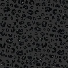 black and white leopard print wallpaper with lots of glitter on it's surface