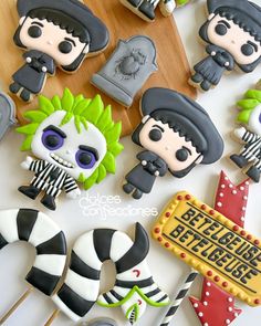 some cupcakes that are decorated to look like they're from beetlejuice