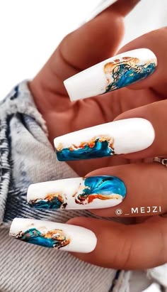 Fun Marble Nails If you are looking for a fun, trendy and colourful nail idea then this is for you! This stylish nail features blue and... Colourful Nail, Nail Idea, Nails 2020, 2020 Trends, Marble Nails, Coffin Nails Designs, Fire Nails, Fancy Nails, Chic Nails