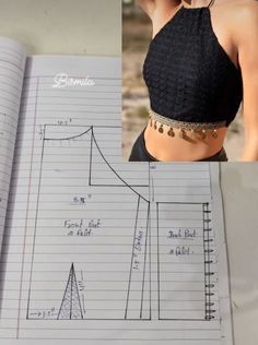 an open notebook with diagrams and photos of a woman's bra top on it