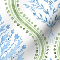 a blue and green floral pattern on white fabric