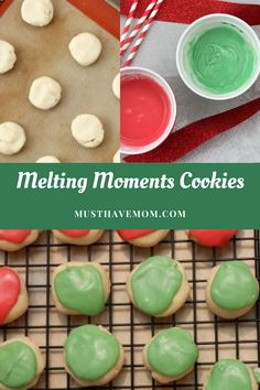 cookies with green and red icing sitting on top of a cooling rack next to cupcakes