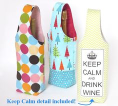 three wine bottles in different patterns and sizes, one with a keep calm and drink wine label