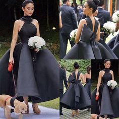 the woman is wearing a black dress and walking her dog