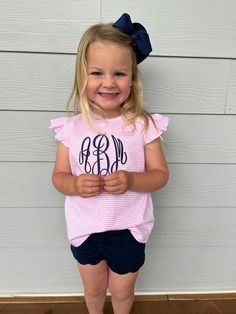 This sweet shirt is perfect for any little gal in your life! Details: Fit is TTS Embroidery covered on inside to prevent irritation 100% Pima Cotton View Fonts here: https://www.etsy.com/listing/889369564/font-options-fonts-and-thread-colors-do?ga_search_query=fonts&ref=shop_items_search_1&frs=1&crt=1&frs=1 Find matching bubble here: etsy.com/listing/1229515826/monogrammed-bubble-boys-bubble-girls?click_key=85767bc716265ae902ff9acef68742f428a51a86%3A1229515826&click_sum=8b8a1818&ref=shop_home_ac Cotton T-shirt With Ruffles And Flutter Sleeves, Cotton Ruffle T-shirt With Flutter Sleeves, Cute Summer T-shirt With Ruffle Sleeves, Fitted Cotton T-shirt With Ruffle Sleeves, Cute Pink Ruffle Sleeve Top, Spring Cotton T-shirt With Ruffle Sleeves, Fitted Cotton Tops With Flutter Sleeve, Fitted Cotton Top With Flutter Sleeves, White Cotton T-shirt With Flutter Sleeves