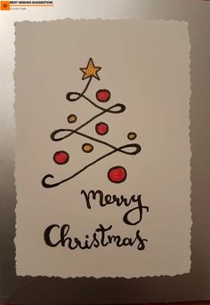 a card with a christmas tree drawn on it