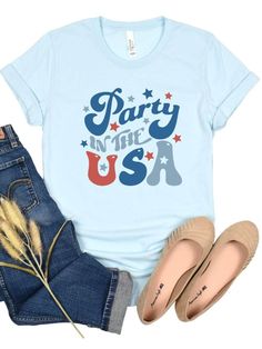 Get ready to party in style this 4th of July with our Party in the USA Patriotic T-shirt! Featuring a bold retro font in classic red and blue, this shirt is the perfect way to show your love for America while having a good time. Made from high-quality Bella + Canvas cotton blend fabric, this shirt is both comfortable and durable. Available in six different colors, you can choose the perfect shade to suit your personal style. And with sizes ranging from XS to XXXL, this shirt is sure to fit every Party In The Usa, Usa Patriotic, Retro Font, Ice Blue, Suits You, Women Collection, Fabric Care, In Style, 4th Of July