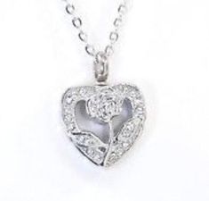 a diamond heart pendant on a chain