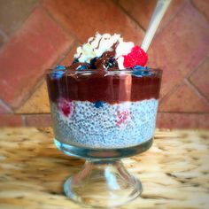 a dessert in a glass bowl on a table