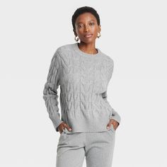 Refresh your knitwear collection with this Cable Crewneck Pullover Sweater from A New Day™. Made from a midweight fabric, this solid-color sweater is adorned with a classic cable-knit pattern. It features a classic crewneck, long sleeves and long-length hem, all accented with ribbed edges for a polished look. Wear it tucked, untucked or half-tucked with your choice of pants and skirts for versatile ensembles. A New Day™: Style that goes wherever you do. Light Gray Sweater Outfit, Light Grey Sweater Outfit, Grey Sweater Outfit, Knitwear Collection, Light Grey Sweater, Solid Color Sweater, Color Sweater, Cable Sweater, Womens Crewneck