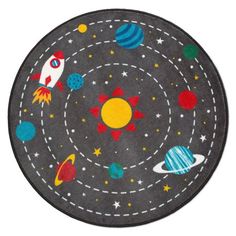 a round rug with planets and stars on it