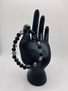 "Black and clear shiny sparkle beads with solid black bead spacers. Size is 6.75-7\" in length, elastic for comfort and some size adjustment.  PLEASE NOTE: IF YOU ARE CONCERNED ABOUT THE SIZE BEING TOO SMALL/LARGE FOR WHAT YOU NEED, PLEASE MESSAGE ME DURING/RIGHT AFTER PURCHASE TO REQUEST A SIZE ADJUSTMENT AND I WILL RE-MAKE THE BRACELET AT NO EXTRA COST (of course, this will extend the time it takes to ship the item, but not by a lot, my main concern is that you are happy with your purchase)" May 7, Black Beads, Beaded Bracelet, Solid Black, Las Vegas, Jewelry Bracelets, Beaded Bracelets, Sparkle, Take That