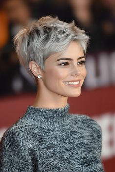 Click for More ➡️ | Save for Later ❤️A bold asymmetrical pixie cut with sharp layers and a striking icy silver color for a modern edge. (Asymmetrical Pixie with Icy Silver - Short Layered Hairstyles) Short Angled Bobs, Short Layered Hairstyles, Asymmetrical Pixie Cuts, Blonde Streaks, Short Shag Haircuts, Asymmetrical Pixie, Blonde Layers, Creamy Blonde, Haircuts For Women Over 50