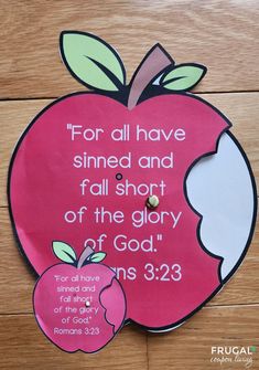 a clock with an apple on it that says for all have sinned and fall short of the glory of god