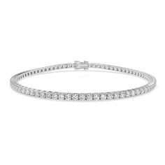 PRICES MAY VARY. Exceptional Brilliance: This bracelet features lab-created simulated diamonds with "D Color" and "VVS1 Clarity," ensuring it radiates the brilliance of the most exceptional natural diamonds. Its unrivaled sparkle will captivate and dazzle. Quality Craftsmanship: Expertly crafted in 18K white gold plated sterling silver, this bracelet combines durability with elegance, ensuring it withstands the test of time and remains a cherished accessory. Versatility in Design: Available for Classic Flexible Diamond Bracelet For Gift, Classic Flexible Diamond Bracelet As Gift, Classic Flexible Bracelets As Gift, White Gold Single Strand Bracelet Gift, White Gold Single Strand Bracelet As Gift, Classic Single Strand Round Bracelet, Bride Birthday, Rare Diamond, Romantic Gestures