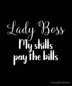 the words lady boss, my skills pay the bills are white on black with a handwritten