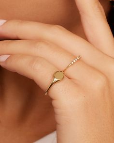 The 14k Gold Bespoke Signet Ring is a timeless style crafted in 14k solid gold. Sure to become a cherished ring they will keep for years-make it even more special by engraving heartfelt initials or a lucky number. Bespoke Signet Ring in 14k Solid Gold, Women's Size 3 by gorjana Signet Ring For Women, Gold Plated Engraved Promise Ring With Polished Finish, Timeless 14k Gold Stackable Rings As Gift, Dainty Yellow Gold Diamond Signet Ring, Gold Signet Ring Woman, 14k Gold Signet Ring With Bezel Setting, Dainty Recycled Gold Signet Ring For Anniversary, Classic 14k Gold Ring With Bezel Setting, Heirloom 14k Gold Initial Ring