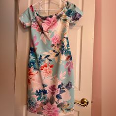 Calvin Klein Off Shoulder Floral Dress With Sleeves. Dress Is Slim Fitted With Zippered Back. Dress Is In Great Condition (Almost Brand New). The Dress Is Floral In Design With Sky Blue, Pink, Cream Colors. I Am Not Good With Colors, I Enclosed A Pics Of The Dress. Please Ask Questions Before Purchasing!!!!!! Off Shoulder Dress With Sleeves, Floral Dress With Sleeves, Floral Off Shoulder Dress, Floral Dresses With Sleeves, Off Shoulder Floral Dress, Dress With Sleeves, Diy Fashion Clothing, Sleeves Dress, Calvin Klein Dress