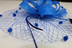 Fascinators Headbands for women,they are great alternative to a traditional hat and a fun way to add a chic and sassy edge to your outfit. Adding a fascinator in different colors to your collection are always a great idea as they never go out of style and they always fit! Finally, don't forget your fascinator for the wedding Handmade Feather Fascinator. Material：Net and Feather. Package including: 1 fascinators hat, 1 Clip, 1 Headband One size fits all. Fascinators base diamereris 11.8 inches .C Blue Adjustable Fascinator For Gift, Derby Headband, Women Tea Party, Hat With Veil, Tea Party Wedding, Kentucky Derby Party, Fascinator Headband, Feather Fascinators, Fascinator Hat