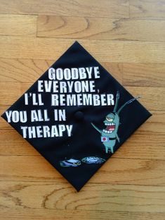 a black graduation cap that says goodbye everyone i'll remember you all in therapy