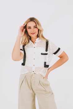 Take your style to the next level with the Higher Levels Top. This unique top features a stunning crochet design, 1 convenient pocket, and a bold color block point for added flair. Upgrade your wardrobe and stand out from the crowd with this must-have top. Details Crochet 1 pocket Color block point Sizing Approximate measurements: SIZE LENGTH BUST One Size 21" 42" Fabric has no stretchModel is 5’9 Material 100% CottonHand wash coldHang dry Short Sleeve Open Knit Crochet Top For Day Out, Trendy White Tops With Crochet Trim, Trendy White Top With Crochet Trim, Trendy Crochet Top With Crochet Trim, Casual White Blouse With Crochet Trim, Chic Open Knit Tops With Relaxed Fit, Casual White Tops With Crochet Trim, Trendy White Cotton Crochet Top, White Cotton Crochet Top In Trendy Style