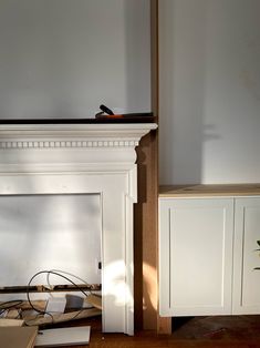 a fire place sitting in the middle of a living room