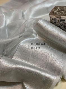 DISCRIPTION Tissue Saree Banarasi Silk Saree With Big Kanchi Border Saree Wedding Wear Girlish Bridal Sari Gift Indian Saree Festive Wear Running Blouse PRODUCT DETAILS Auction For: 1 Saree with Blouse Piece Color: As shown in the picture Condition: New Work: zari border Saree fabric : pure linen Saree length : 5.5 meters Blouse length : 0.8 meters Washing Instructions: Dry Clean Only Occasions: Wedding Wear, Party Wear, Festive Wear, Durga Puja, Indian Wear, Sangeet Wear, Bridal Wear, Chrismas Silver Zari Work Blouse Piece For Wedding, Silver Blouse Piece With Zari Work For Wedding, Traditional Silver Dupatta For Formal Occasion, Silver Chanderi Saree For Wedding, Silver Wedding Blouse Piece With Sheer Dupatta, Silver Tissue Silk Dupatta With Cutdana, Silver Tissue Silk Dupatta For Eid, Silver Traditional Drape Blouse Piece For Wedding, Silver Blouse Piece With Sheer Dupatta For Wedding