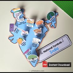 a paper cut out of the shape of india with information about its national symbols on it