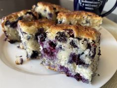 two slices of blueberry coffee cake on a plate