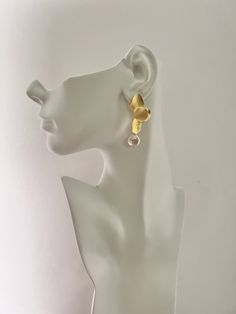 Gold Floral Coin Pearl Earrings Elegant matte gold orchid flower earrings with coin pearl dangle.  One petal is bent to look unique. Very lightweight. Dangle length is 50mm from ear post. CUSTOM REQUESTS ARE ALWAYS WELCOME! ~ Feel free to message me if you have any questions or special requests ... I will do my best to accommodate. ~ If the size you are wanting is not shown in the menu, contact me before ordering as there may be an additional charge for extra material ~ custom lengths for most n Elegant Yellow Gold Wrap Earrings For Party, Elegant Metal Wrap Earrings For Gift, Elegant Metal Single Wrap Earring, Elegant Single Metal Wrap Earring, Gold Flower Earrings For Formal Occasions, Gold Single Flower Earring For Formal Events, Elegant Single Flower Earring For Anniversary, Elegant Gold Flower Earrings For Evening, Elegant Gold Flower Earrings For Formal Occasions