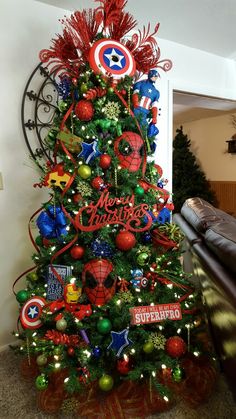 a christmas tree decorated with red, white and blue decorations