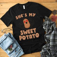 "Our 'She's My Sweet Potato' Shirt comes in multiple styles. Hey boyfriends, surprise your girlfriend with this cute gift idea! Wear it to the fair, a party, or any event where you want to show the world that you love each other. Perfect for him and her - guys, gals, boys, and girls! ABOUT THIS PRODUCT: * Most fabrics are soft 100% ringspun cotton. Heather colors are a super soft polyester blend. * Need it fast? Choose Express shipping at checkout. * Need it by a certain date? Contact us! * We d Happy Potato, Funny Wife Shirts, Vegan T Shirt, Funny Boyfriend Gifts, Kawaii Shirt, Surprise Your Girlfriend, Bff Shirts, Lounge Shirt, Girlfriend Shirts