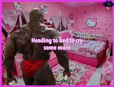 a bodybuilding man standing in front of a pink bedroom with hello kitty decorations on the walls