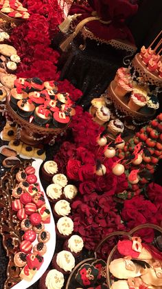 an assortment of desserts and pastries on display