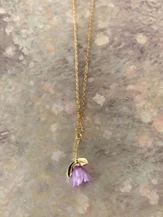 "Lovely light purple and gold tone hanging tulip pendant, purple tulip jewelry, tulip necklace, tulip pendant, tulip jewelry, purple tulip, purple tulip gifts, necklace tulip.  Tulip measures 1\" L X 5/8\" W and is on an 18\" chain.   ★ Want to see more?  Please visit my shop at: https://www.etsy.com/shop/DesignsByPeg" Tulip Gifts, Tulip Jewelry, Tulip Necklace, Acrylic Pendant, Jewelry Purple, Purple Tulips, Image Hd, Light Purple, Things To Buy